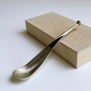 Pewter sugar spoon by Artesia Pewter