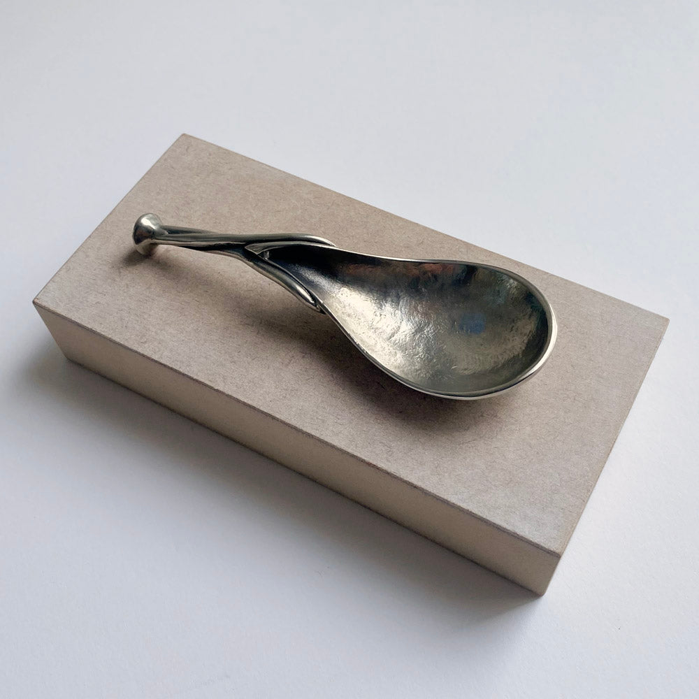 Pewter cream spoon by Artesia Pewter