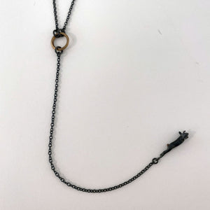 'Down the rabbit hole' necklace in oxidised sterling silver and gold by Taë Schmeisser