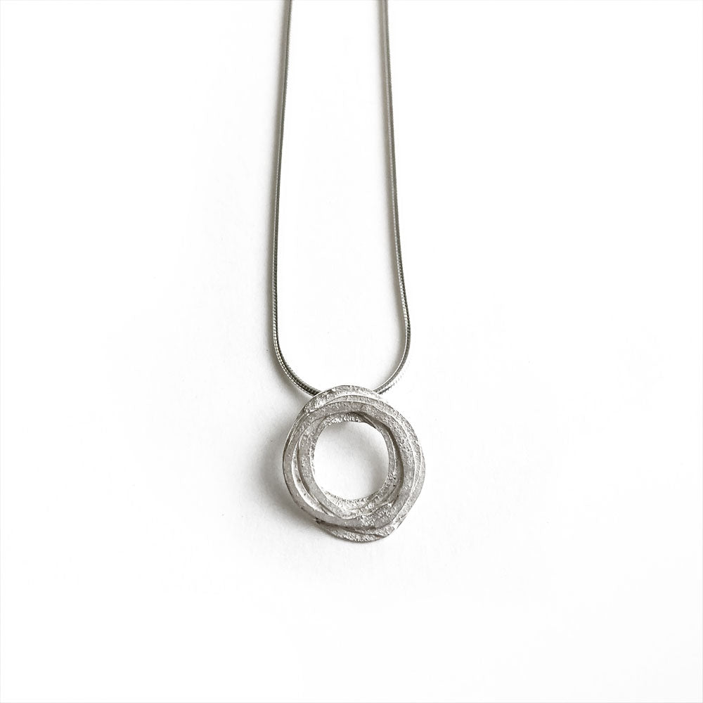 'Wrap' pendant in sterling silver by Shimara Carlow