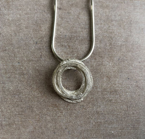 'Wrap' pendant in sterling silver by Shimara Carlow