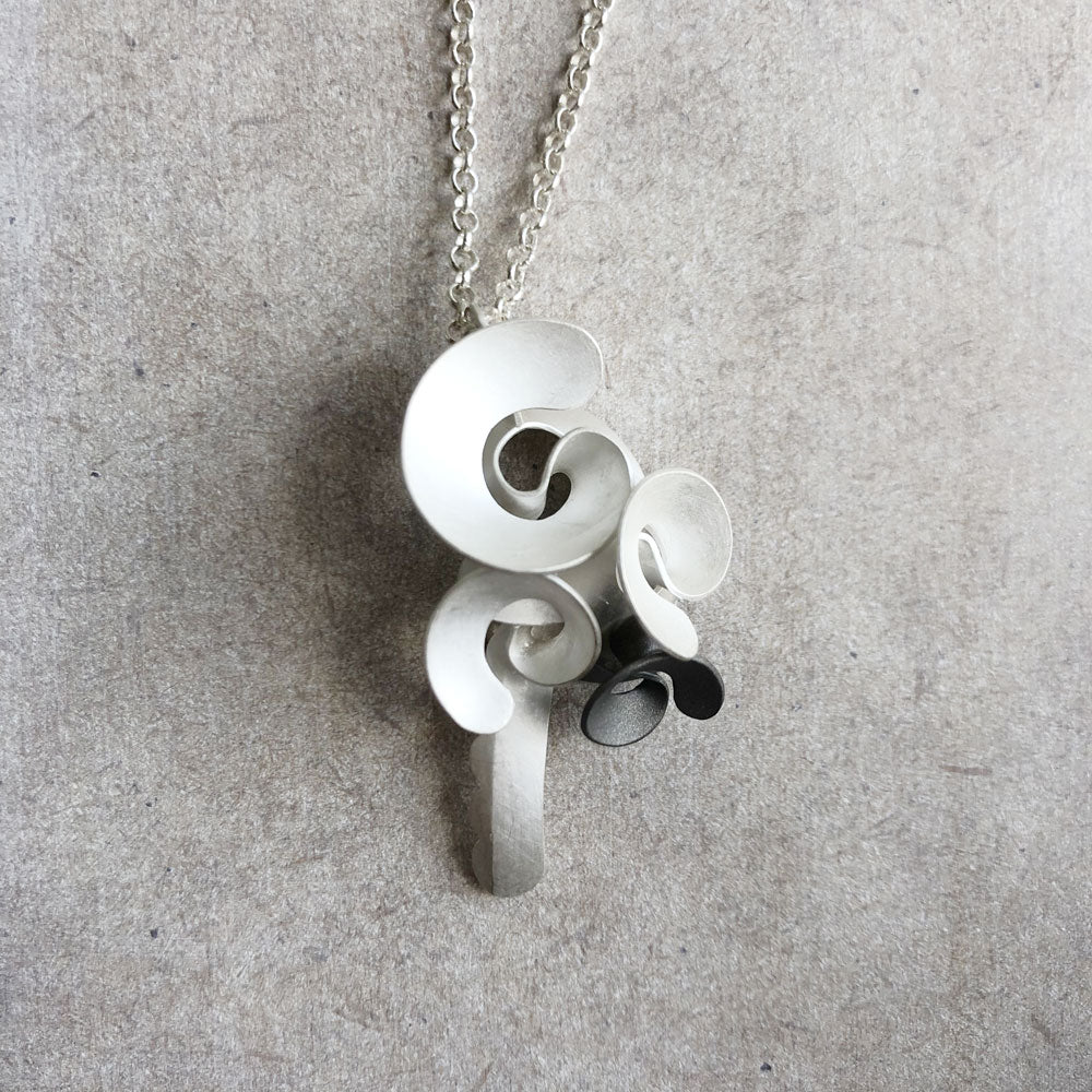 'Cloud' long pendant in sterling silver and oxidised sterling silver by Daehoon Kang