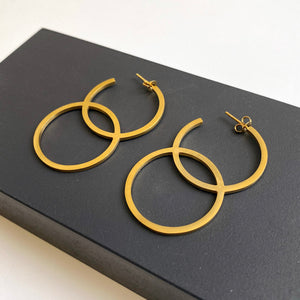 'Double Circle' earrings in gold by Melanie Katsalidis